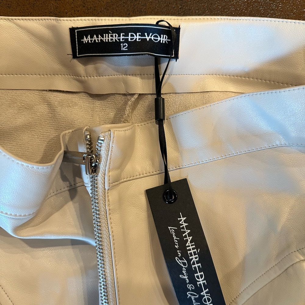 Maniere De Voir Tacked Vegan Leather Flared Trousers in beige - Picture 5 of 6